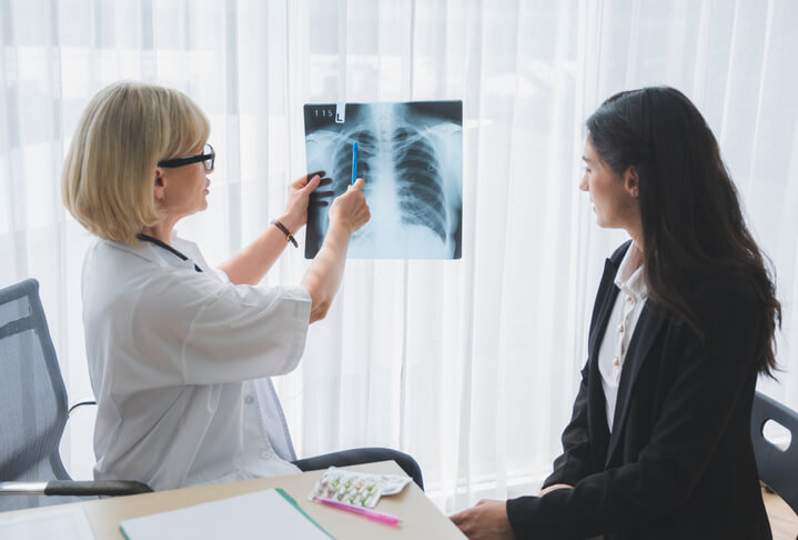 internal medicine doctor talking to patient