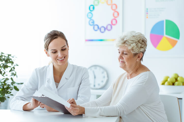 internal medicine doctor talking to patient